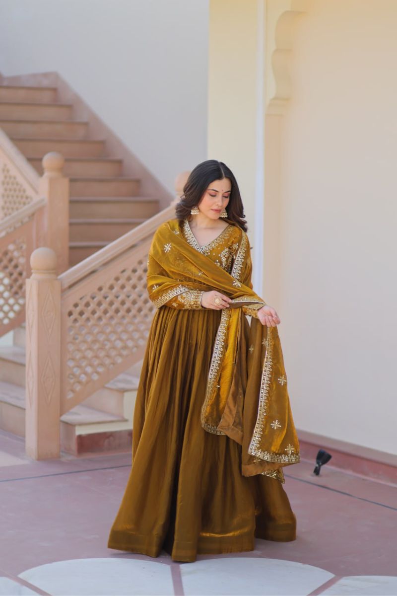 Mustard Fendy Fabric Gown with Embroidered Work and Dupatta Sequins