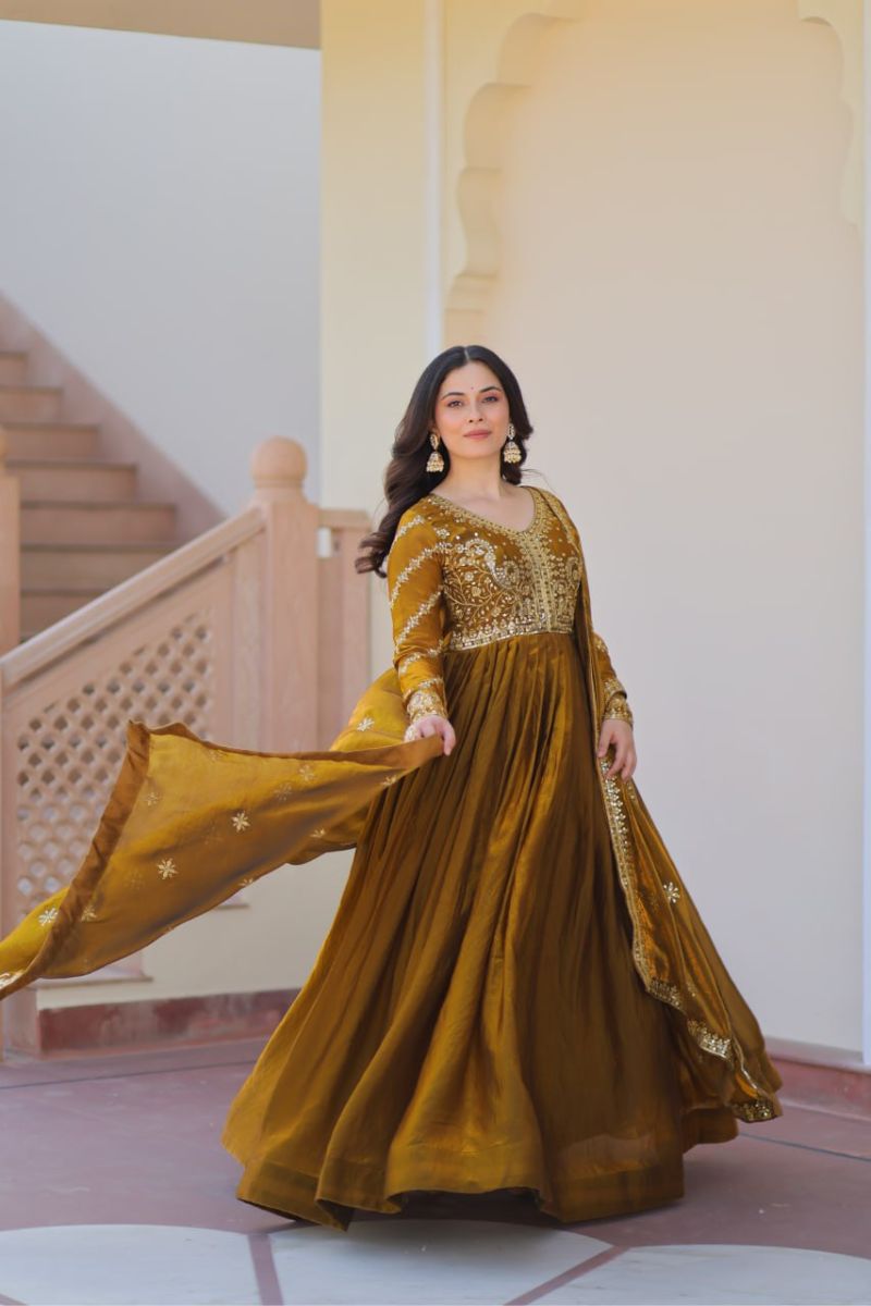 Mustard Fendy Fabric Gown with Embroidered Work and Dupatta Sequins