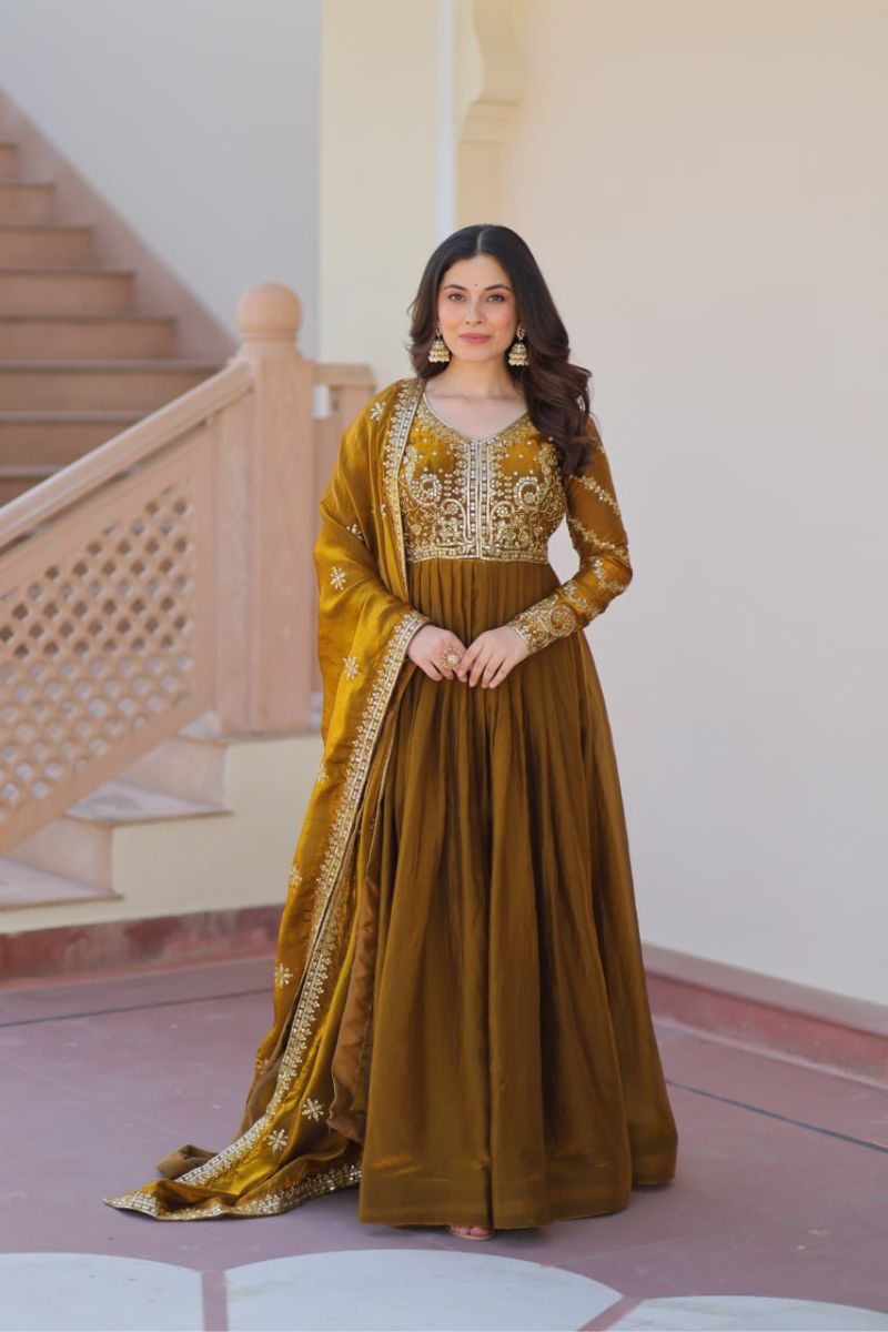 Mustard Fendy Fabric Gown with Embroidered Work and Dupatta Sequins